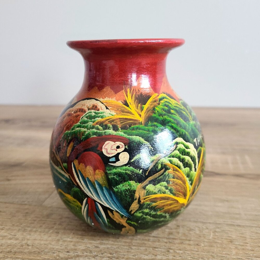 Vintage hand painted ceramic vase with exotic birds. Signed by artist pottery.